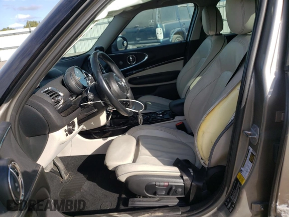 2017 MINI Clubman Cooper S with VIN WMWLU5C36H2E83921, listed as a Copart auction lot 79326784 with 133,564 mi miles and Salvage Title. Bid and sale history available at carsss.com. Image 7.