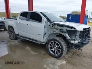 2018 GMC Canyon 4WD Denali with VIN 1GTP6EE16J1171424, listed as a IAAI auction lot 41397106 with 105,922 mi miles. Bid and sale history available at carsss.com. Image 1.