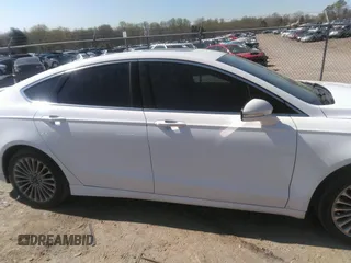 2016 Ford Fusion Titanium with VIN 3FA6P0K93GR331947, listed as a IAAI auction lot 41828409 with 181,555 mi miles and . Bid and sale history available at DreamBid. Image 13.
