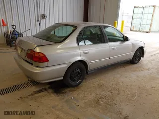 1999 Honda Civic EX with VIN 1HGEJ8640XL013417, listed as a IAAI auction lot 41915827 with 257,696 mi miles. Bid and sale history available at carsss.com. Image 4.