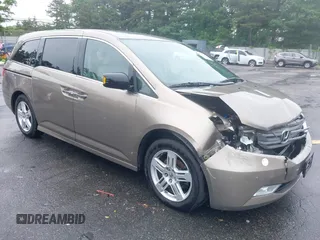 2012 Honda Odyssey Touring with VIN 5FNRL5H98CB015804, listed as a IAAI auction lot 42393173 with 139,399 mi miles and . Bid and sale history available at DreamBid. Image 1.