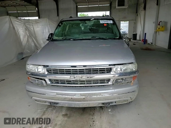 2004 Chevrolet Tahoe LT with VIN 1GNEC13Z14J323770, listed as a Copart auction lot 57846675 with 140,232 mi miles and Salvage title. Bid and sale history available at DreamBid. Image 13.