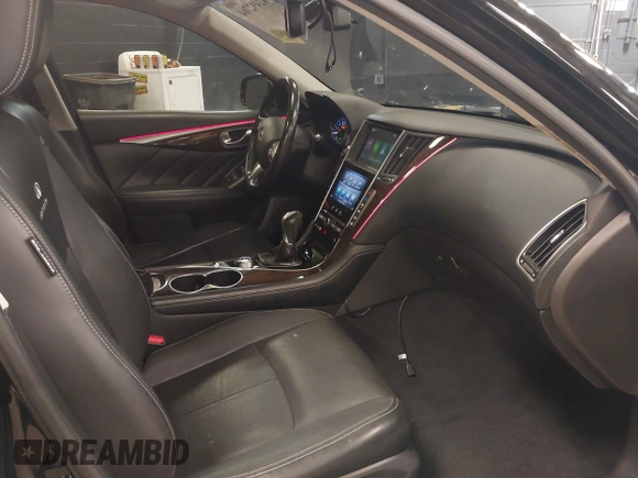 2014 Infiniti Q50 Sport with VIN JN1BV7AR0EM704993, listed as a IAAI auction lot 42492764 with 64,811 mi miles and . Bid and sale history available at DreamBid. Image 5.
