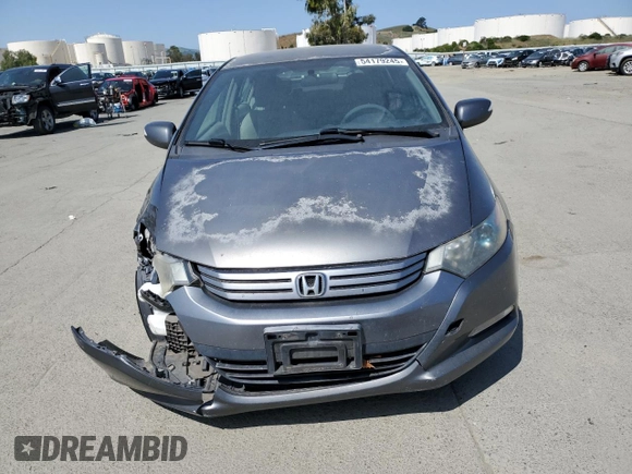2010 Honda Insight EX with VIN JHMZE2H7XAS021268, listed as a Copart auction lot 54179245 with 211,561 mi miles and Salvage Title. Bid and sale history available at DreamBid. Image 5.