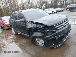 2019 Volkswagen Atlas SEL z VIN 1V2MR2CA4KC592087, wystawiony jako IAAI lot #41961829 z przebiegiem 101 267 mil mil oraz . Historia ofert i sprzedaży dostępna na DreamBid. Obrazek 1.