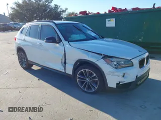 2014 BMW X1 xDrive28i with VIN WBAVL1C51EVY11386, listed as a IAAI auction lot 41106167 with 122,806 mi miles. Bid and sale history available at carsss.com. Image 1.