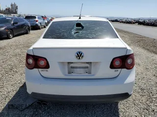 2010 Volkswagen Jetta Limited Edition z VIN 3VWAZ7AJ3AM115147, wystawiony jako Copart lot #52068825 z przebiegiem 154 804 mil mil oraz Szkoda całkowita • Salvage title. Historia ofert i sprzedaży dostępna na DreamBid. Obrazek 6.