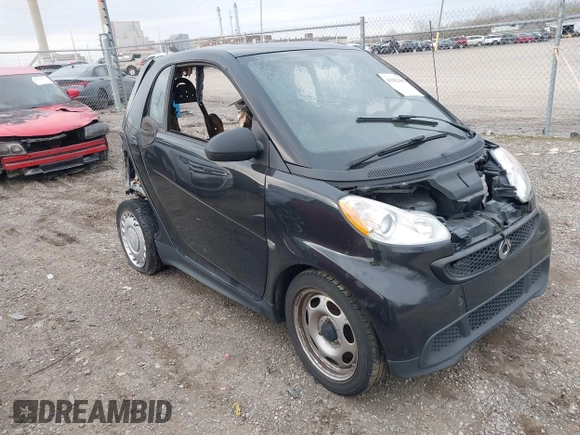 2015 Smart fortwo Passion with VIN WMEEJ3BA8FK811800, listed as a IAAI auction lot 41982401 with Not Provided miles and . Bid and sale history available at DreamBid. Image 1.