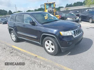 2011 Jeep Grand Cherokee Laredo z VIN 1J4RR4GG0BC655780, wystawiony jako IAAI lot #42268630 z przebiegiem 158 343 mil mil oraz . Historia ofert i sprzedaży dostępna na DreamBid. Obrazek 1.