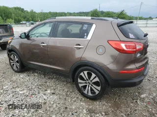 2012 Kia Sportage EX z VIN KNDPC3A25C7187402, wystawiony jako Copart lot #57853615 z przebiegiem 175 903 mil mil oraz Szkoda całkowita • Salvage title. Historia ofert i sprzedaży dostępna na DreamBid. Obrazek 2.