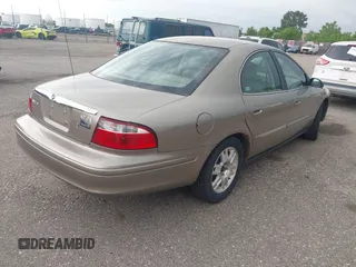 2005 Mercury Sable LS z VIN 1MEFM55S85A605535, wystawiony jako IAAI lot #42490113 z przebiegiem 112 031 mil mil oraz . Historia ofert i sprzedaży dostępna na DreamBid. Obrazek 4.