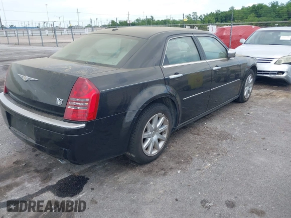 2007 Chrysler 300 C with VIN 2C3LA63H97H861511, listed as a IAAI auction lot 42136495 with 113,972 mi miles. Bid and sale history available at carsss.com. Image 4.