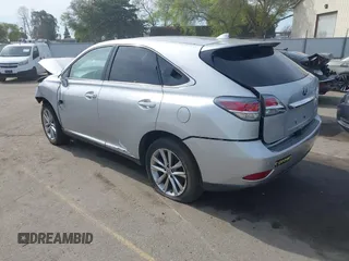 2015 Lexus RX 450h with VIN 2T2ZB1BA7FC002089, listed as a IAAI auction lot 41826675 with 100,852 mi miles and . Bid and sale history available at DreamBid. Image 3.