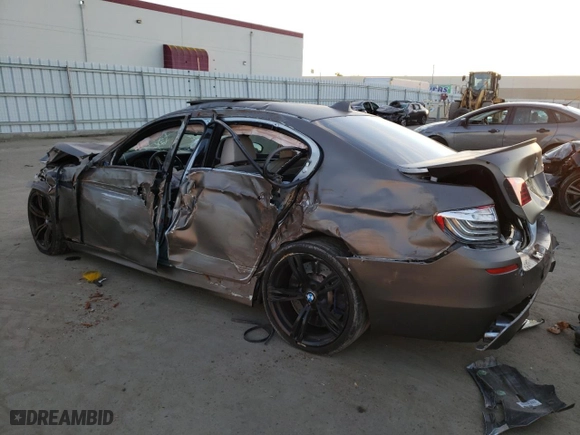 2015 BMW M5 with VIN WBSFV9C5XFD595067, listed as a Copart auction lot 80183913 with 0 mi miles. Bid and sale history available at carsss.com. Image 2.
