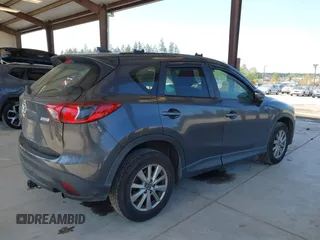 2016 Mazda CX-5 Sport with VIN JM3KE4BY1G0910102, listed as a IAAI auction lot 42115163 with 144,495 mi miles and . Bid and sale history available at carsss.com. Image 4.