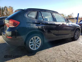 2015 BMW X1 xDrive28i with VIN WBAVL1C5XFVY31850, listed as a Copart auction lot 77491614 with 112,442 mi miles and Clean Title. Bid and sale history available at carsss.com. Image 3.