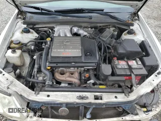 2001 Toyota Avalon XL z VIN 4T1BF28B31U136069, wystawiony jako Copart lot #57355025 z przebiegiem 217 489 mil mil oraz Szkody całkowita. Historia ofert i sprzedaży dostępna na DreamBid. Obrazek 11.