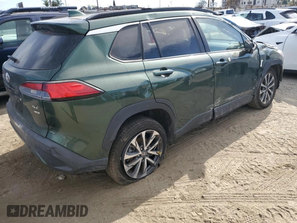 2023 Toyota Corolla Cross XLE z VIN 7MUDAABG2PV047865, wystawiony jako Copart lot #52755985 z przebiegiem 23 787 mil mil oraz Szkoda całkowita • Salvage title. Historia ofert i sprzedaży dostępna na DreamBid. Obrazek 3.