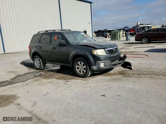 2009 Mazda Tribute Touring with VIN 4F2CZ02789KM01858, listed as a Copart auction lot 86294704 with NaN miles and Salvage Title. Bid and sale history available at carsss.com. Image 12.