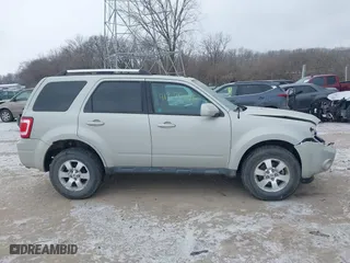 2009 Ford Escape Limited with VIN 1FMCU047X9KC30599, listed as a IAAI auction lot 41375656 with 122,185 mi miles. Bid and sale history available at carsss.com. Image 13.