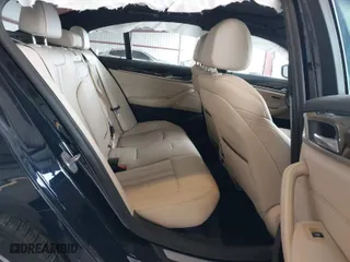 2019 BMW 5 Series 530e iPerformance with VIN WBAJA9C50KB254535, listed as a IAAI auction lot 41094049 with 57,874 mi miles. Bid and sale history available at carsss.com. Image 8.