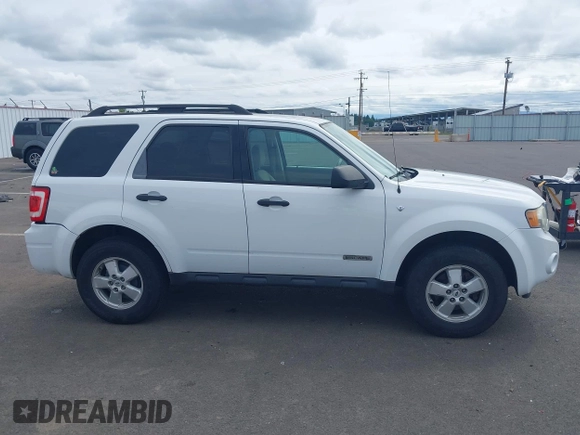 2008 Ford Escape XLT with VIN 1FMCU03188KA91326, listed as a IAAI auction lot 42293474 with 197,945 mi miles and . Bid and sale history available at DreamBid. Image 13.