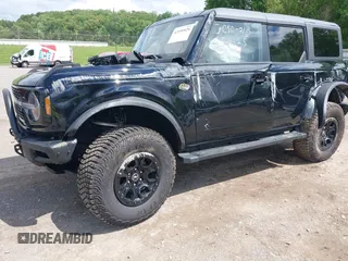 2024 Ford Bronco Wildtrak with VIN 1FMEE2BP1RLA75293, listed as a IAAI auction lot 42199529 with 6,466 mi miles and . Bid and sale history available at DreamBid. Image 17.