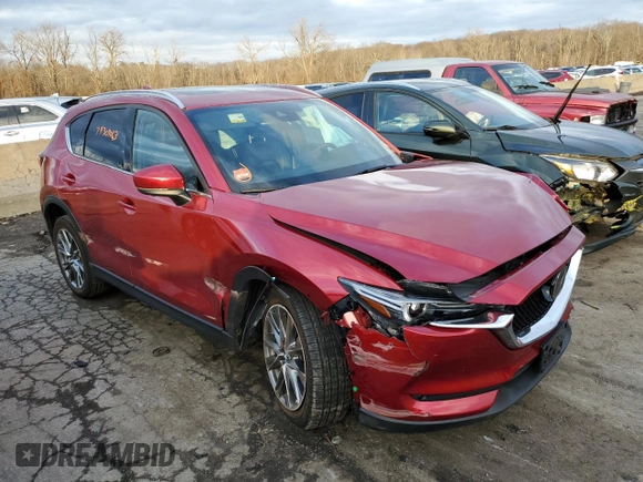 2021 Mazda CX-5 Signature with VIN JM3KFBEY2M0351720, listed as a Copart auction lot 79309063 with 21,349 mi miles and Salvage Title. Bid and sale history available at carsss.com. Image 4.