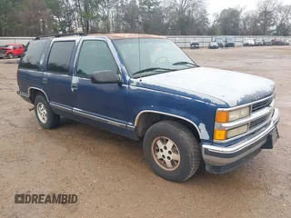 1995 Chevrolet Tahoe z VIN 1GNEC13K3SJ439116, wystawiony jako IAAI lot #41659942 z przebiegiem 203 848 mil mil oraz . Historia ofert i sprzedaży dostępna na DreamBid. Obrazek 1.