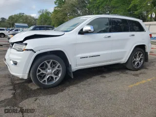 2019 Jeep Grand Cherokee Overland with VIN 1C4RJECG4KC833019, listed as a Copart auction lot 51277555 with 124,072 mi miles and Salvage Title. Bid and sale history available at carsss.com. Image 1.