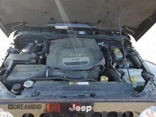 2015 Jeep Wrangler Unlimited Sahara with VIN 1C4HJWEGXFL744852, listed as a Copart auction lot 60246145 with 135,496 mi miles and Salvage title. Bid and sale history available at DreamBid. Image 12.