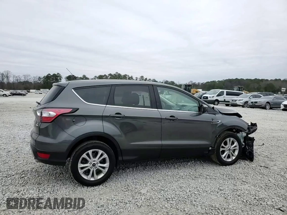 2017 Ford Escape SE with VIN 1FMCU0GD5HUC67421, listed as a Copart auction lot 86633734 with 82,929 mi miles and Salvage Title. Bid and sale history available at DreamBid. Image 15.