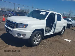 2009 Honda Ridgeline RTL with VIN 5FPYK16529B107871, listed as a IAAI auction lot 42049833 with 141,214 mi miles. Bid and sale history available at carsss.com. Image 19.