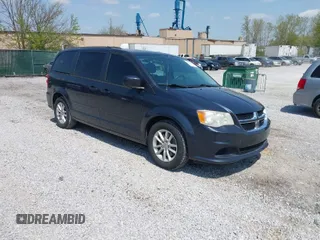2014 Dodge Grand Caravan SXT z VIN 2C4RDGCG2ER120666, wystawiony jako IAAI lot #42031657 z przebiegiem 126 467 mil mil oraz . Historia ofert i sprzedaży dostępna na DreamBid. Obrazek 1.