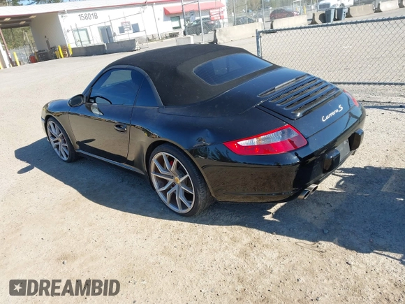 2006 Porsche 911 Carrera S with VIN WP0CB29926S766815, listed as a IAAI auction lot 42078069 with 76,580 mi miles. Bid and sale history available at carsss.com. Image 3.