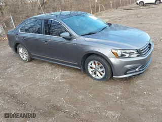 2016 Volkswagen Passat 1.8T S with VIN 1VWAS7A37GC026679, listed as a IAAI auction lot 41229736 with 193,792 mi miles. Bid and sale history available at carsss.com. Image 1.