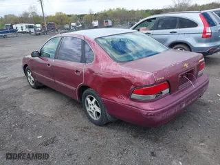 1997 Toyota Avalon XL with VIN 4T1BF12B5VU185685, listed as a IAAI auction lot 42037605 with 150,999 mi miles. Bid and sale history available at carsss.com. Image 3.