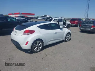 2016 Hyundai Veloster z VIN KMHTC6AD9GU272411, wystawiony jako IAAI lot #41904711 z przebiegiem 133 490 mil mil oraz . Historia ofert i sprzedaży dostępna na DreamBid. Obrazek 4.