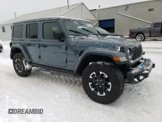 2024 Jeep Wrangler Rubicon with VIN 1C4RJXR66RW237347, listed as a Copart auction lot 88774995 with 18,018 mi miles and Salvage Title. Bid and sale history available at DreamBid. Image 4.