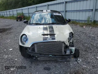 2012 MINI Coupe S z VIN WMWSX3C56CT154872, wystawiony jako Copart lot #68011264 z przebiegiem 91 650 mil mil oraz Szkody całkowita. Historia ofert i sprzedaży dostępna na DreamBid. Obrazek 5.