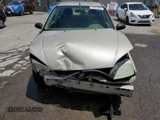 2006 Ford Focus S z VIN 1FAFP34N46W154378, wystawiony jako Copart lot #58422605 z przebiegiem Nie podano mil oraz Szkoda całkowita • Salvage title. Historia ofert i sprzedaży dostępna na DreamBid. Obrazek 5.