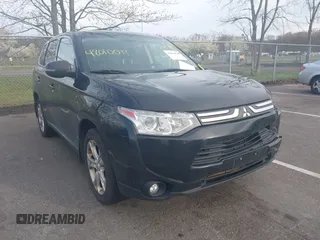 2014 Mitsubishi Outlander GT z VIN JA4JZ4AX2EZ003881, wystawiony jako IAAI lot #42010099 z przebiegiem 143 840 mil mil oraz . Historia ofert i sprzedaży dostępna na DreamBid. Obrazek 1.