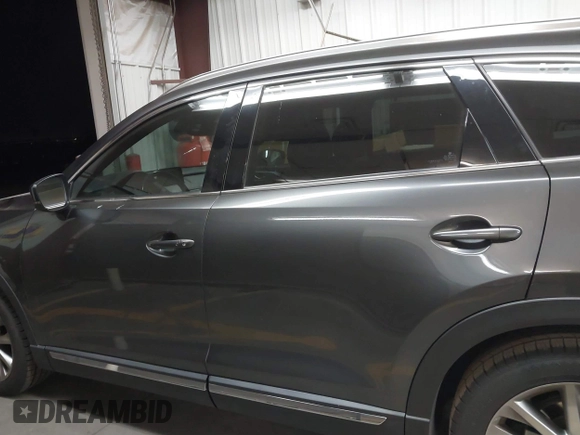 2017 Mazda CX-9 Grand Touring z VIN JM3TCADY2H0134070, wystawiony jako IAAI lot #41611243 z przebiegiem 87 046 mil mil oraz . Historia ofert i sprzedaży dostępna na DreamBid. Obrazek 14.