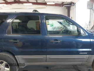 2002 Ford Escape XLT with VIN 1FMCU031X2KA37050, listed as a IAAI auction lot 42024674 with 199,249 mi miles. Bid and sale history available at carsss.com. Image 13.