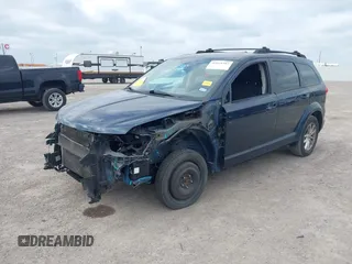 2015 Dodge Journey SXT with VIN 3C4PDCBG6FT744034, listed as a IAAI auction lot 42029387 with 101,743 mi miles. Bid and sale history available at carsss.com. Image 2.