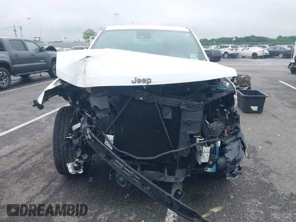 2021 Jeep Grand Cherokee 80th Anniversary with VIN 1C4RJFBG2MC568028, listed as a IAAI auction lot 42381104 with 51,027 mi miles and . Bid and sale history available at DreamBid. Image 6.