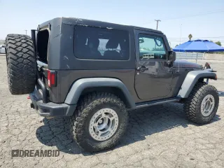 2016 Jeep Wrangler Rubicon z VIN 1C4BJWCG3GL275971, wystawiony jako Copart lot #60329125 z przebiegiem 25 956 mil mil oraz Szkoda całkowita • Salvage title. Historia ofert i sprzedaży dostępna na DreamBid. Obrazek 3.