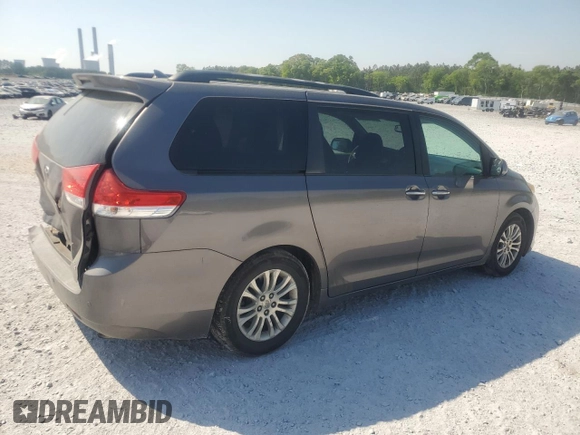 2011 Toyota Sienna XLE AAS с VIN 5TDYK3DC1BS170967, выставлен на аукционе Copart как лот 53848955 с пробегом 171 115 миль миль и Списание • Salvage title. История ставок и продаж доступна на DreamBid. Изображение 3.