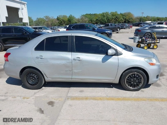 2009 Toyota Yaris with VIN JTDBT903891331057, listed as a IAAI auction lot 41849148 with 182,142 mi miles. Bid and sale history available at carsss.com. Image 13.