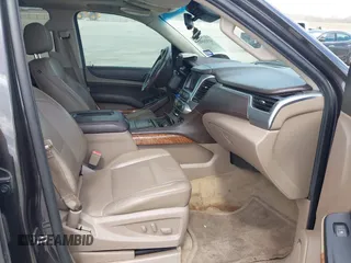2015 Chevrolet Suburban LTZ with VIN 1GNSCKKC9FR500933, listed as a IAAI auction lot 41830980 with 169,217 mi miles and . Bid and sale history available at DreamBid. Image 5.